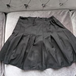 Girls pleated black skirt like new